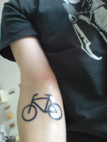 I thought it would be funny - bike tattoo on one wrist, 