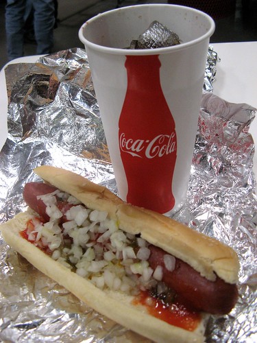 Polish Hot Dog + Soda = A buck fifty .