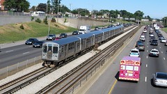 Westbound CTA Blue line train as seen from the Canfield Road overpass bridge. Chicago Illinois. June 2008.