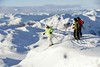 Skiers prepare for descent at Hemsedal, Norway