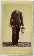 Trick photo, decapitated man with bloody knife, holding his head