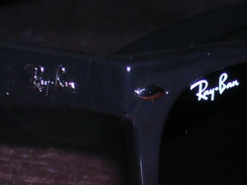 ray ban logo. The Ray Ban logo on the lens