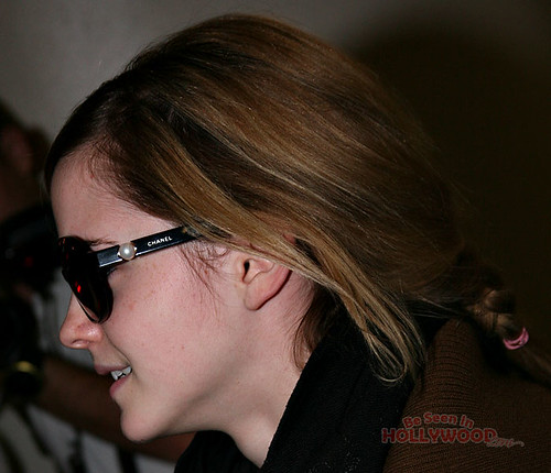 Emma Watson wearing Chanel Glasses