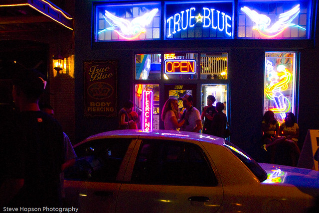 The True Blue tattoo parlour in Austin Texas, open during the nighttime 