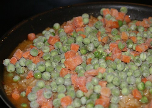 toss in frozen peas & carrots, shred chicken while veggies steam