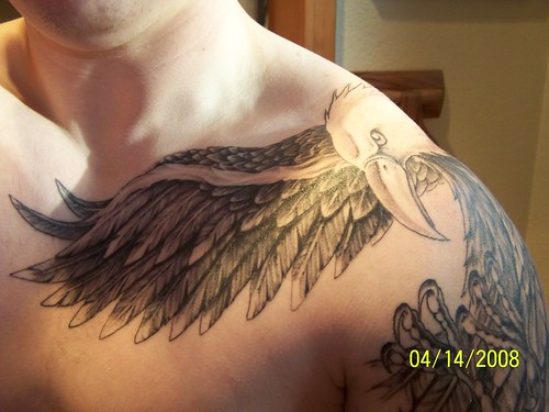 tribal tattoos on shoulder and chest. american eagle tattoo shoulder
