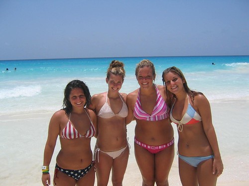 Four sexy chubby bikini girls on beach