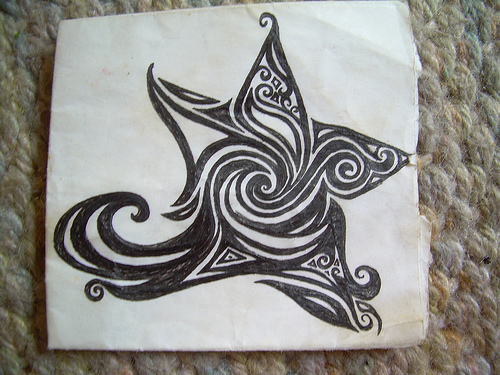 Symbol star tattoo