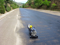 Wet tar on the road near Chingning, Gansu Province, China