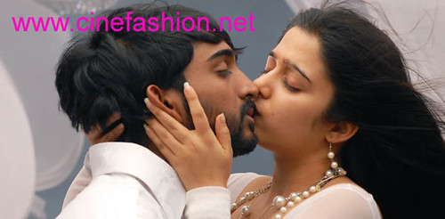Sexy actress Charmi kissing scene in Laadam