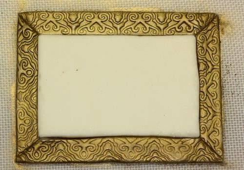 fondant frame with antique gold luster dust