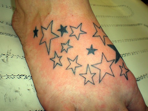 Nice Star Tattoo On Foot