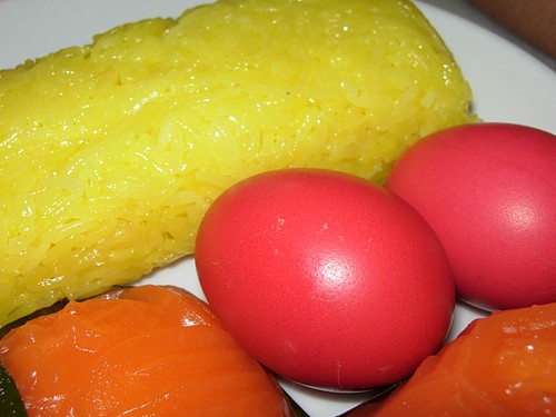 red eggs and nasi kunyit (tumeric rice)