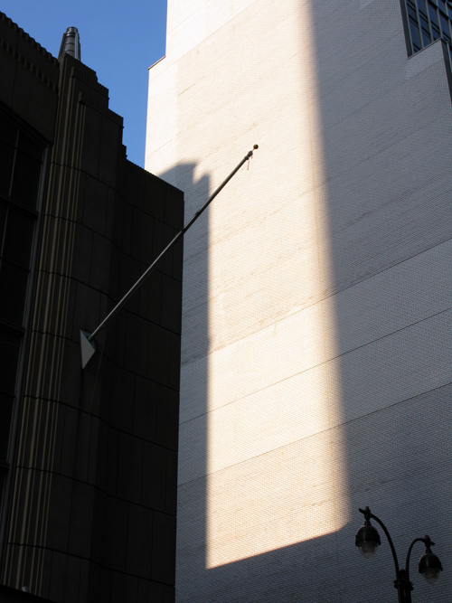 composition with empty flag pole, Manhattan, NYC