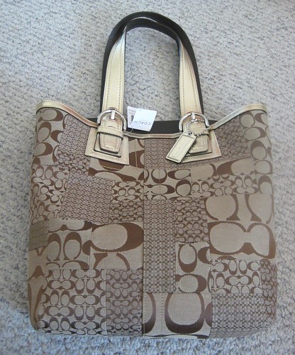 Coach Soho Signature Tote by you.