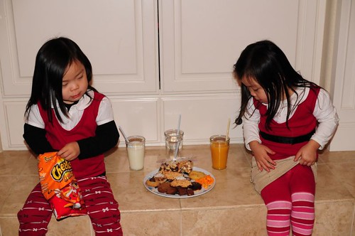Whoo, we're tuckered out after making that Santa plate, better have a few restorative cheetos