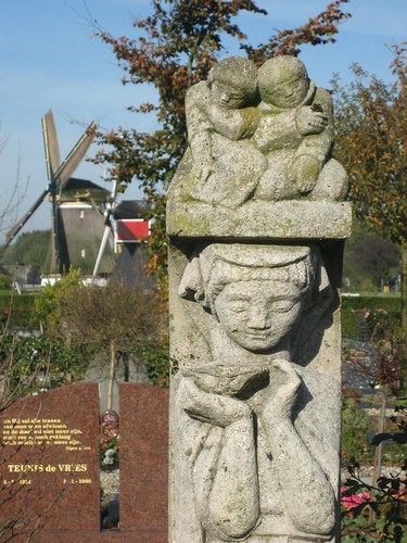 Gravemarker with windmills in the background, Oud-Zuilen cemetery