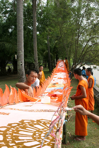 Watermelon shape stupa · Monks are building a fire boat 1