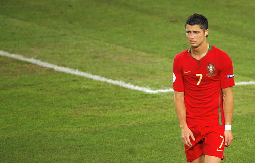 Cristiano Ronaldo looks dejected after Michael Ballack scored