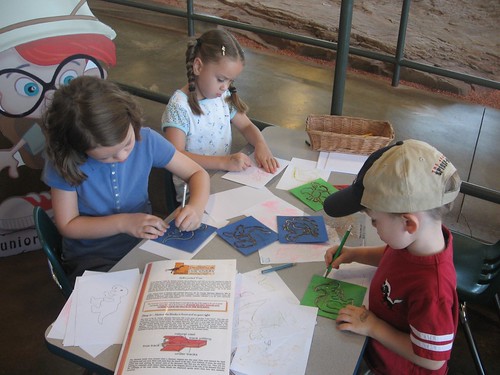 Tracing dinosaurs at the tracks museum.