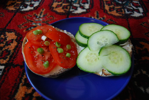 Bagel with tomato, scallions, cucumber and cream cheese