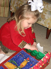 sarah opening a present