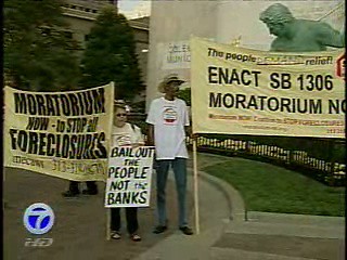 Members of the Moratorium Now! Coalition to Stop Foreclosures and Evictions held a protest demonstration against the bailout of Wall Street. This event occured on Sept. 25, 2009 in downtown Detroit. (Channel 7 Photo). by Pan-African News Wire File Photos