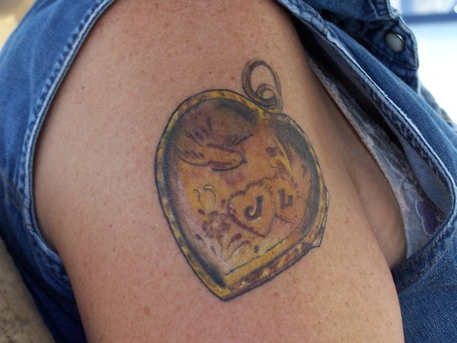 Rose Tattoo; Puerto Rican Flag tattoo; Locket and Key Tattoo