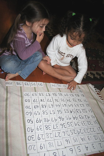 Shaye and Naia figuring out the hundred board together