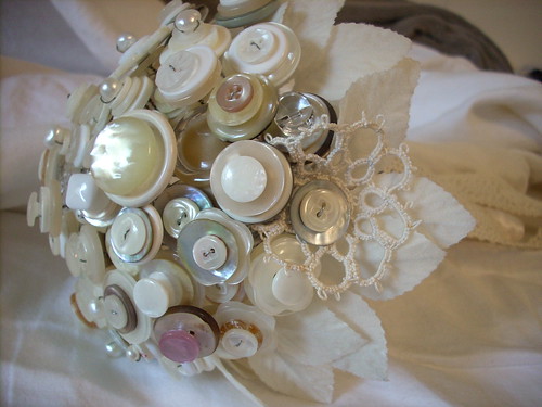made this bouquet out of random pearly buttons fresh water pearls 24 gauge
