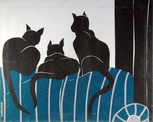 Marushka - three black cats on blue striped couch