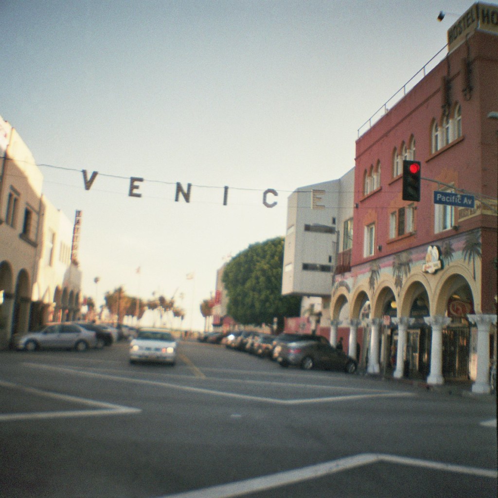 Lomography Diana Mini 35mm photo of Venice Beach sign on street welcoming tourists in Los Angeles for the summer