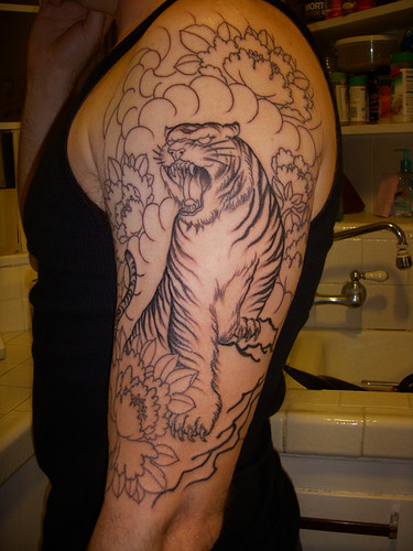 Side view of tattoo Left arm stage