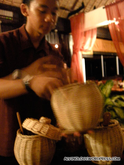 The Rice Master scooping out all the rice variety for us to sample