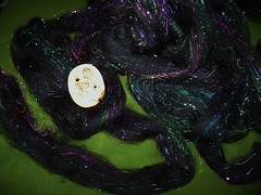 Peacock batts made into roving