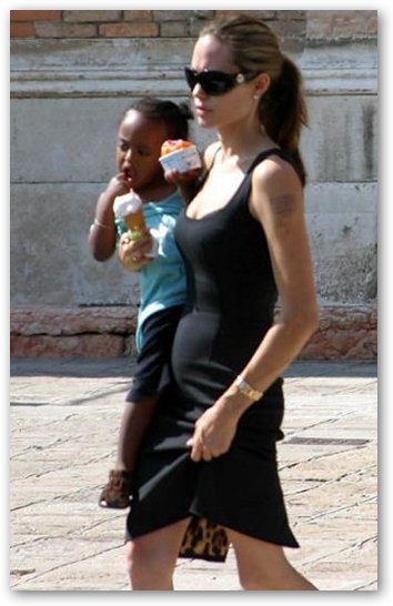 Angelina Jolie Pregnant and Holding Zahara