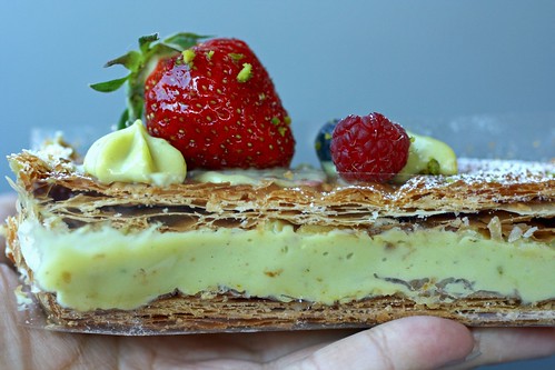 Millefeuille filled with pistachio cream and strawberries