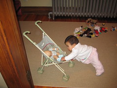 Aki playing with baby doll