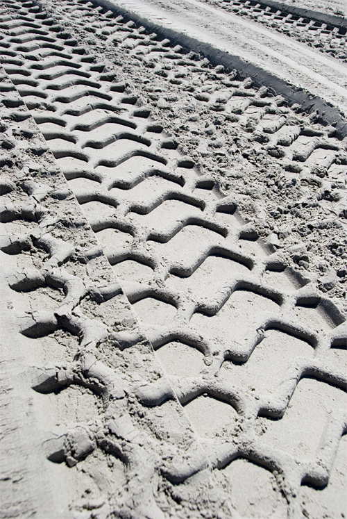 tire-tracks-sand