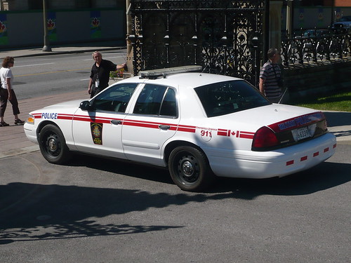 A Canadian Forces Ford Crown Victoria Military Police car and the Peace 