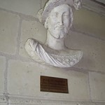 Chambord. Bust of King Francis I attached to a calcareous stone wall
