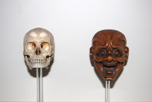 Skull and mask netsuke