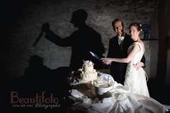 Olivier & Ann-Elise Wedding: cutting (stabbing) the cake by beautifoto