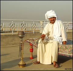 Hooked to the hookah by Chacha Noor