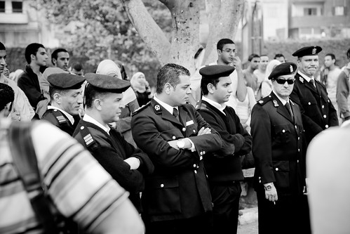 Police officers monitoring the students أمن الجامعة يراقب الطلبة