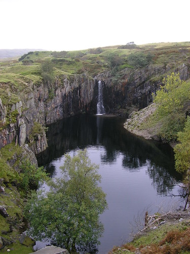 Waterfall into the remains of a quarry