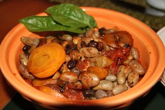 cooked beans in orange bowl