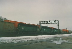 Two trains meet on the Burlington Northern Railroad. La Grange Illinois. January 1987.