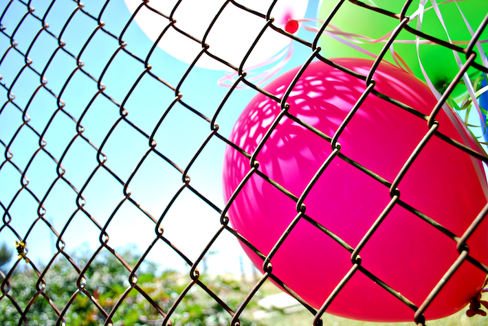 Fenced Balloons.