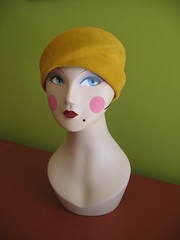Mimi with mustard color cloche hat